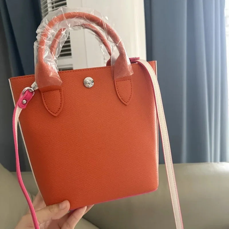Maxy High quality new cowhide large capacity multifunctional bag, shoulder bag, color blocking handbag, hand-held bucket, women's bag